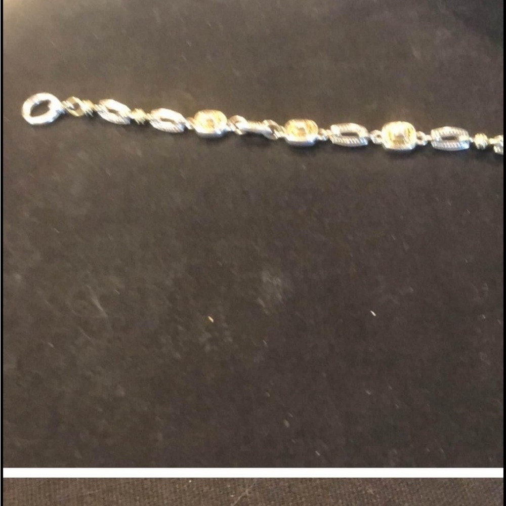 Elegant Silver and Gold Bracelet
